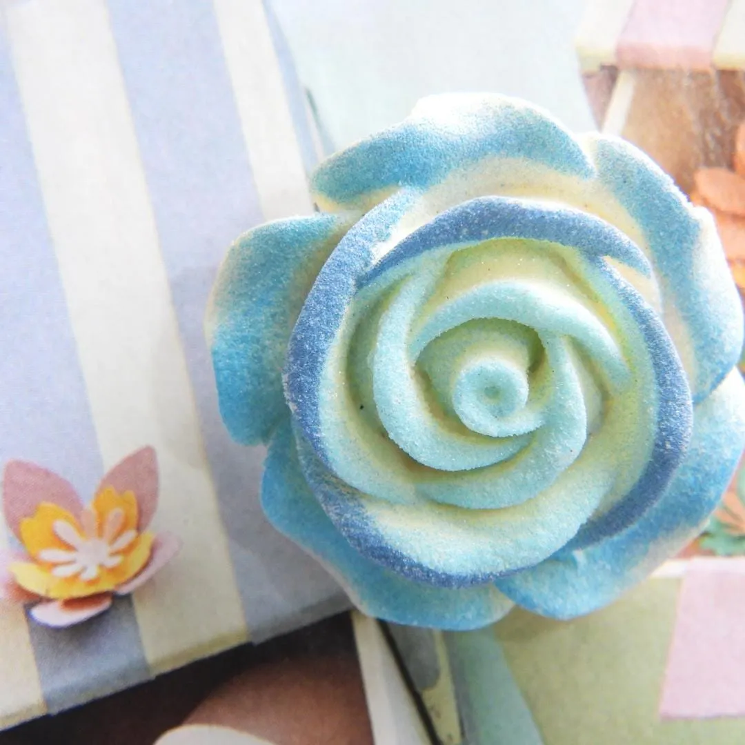 Blue rose flower button