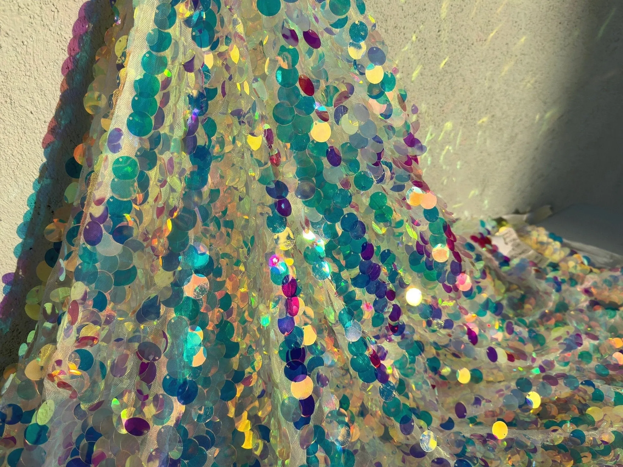 Iridescent Coin Sequin on White Mesh Fabric