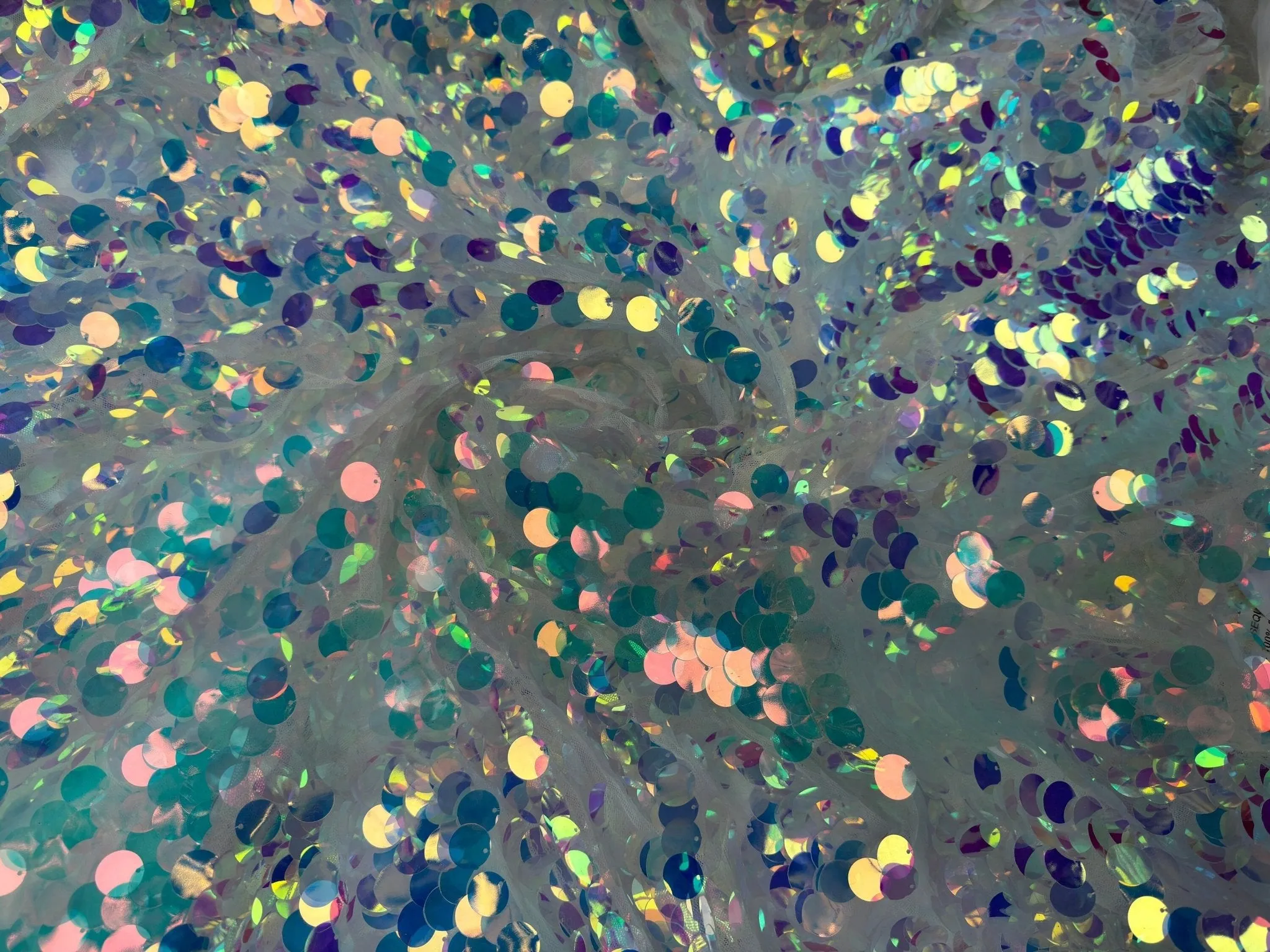 Iridescent Coin Sequin on White Mesh Fabric
