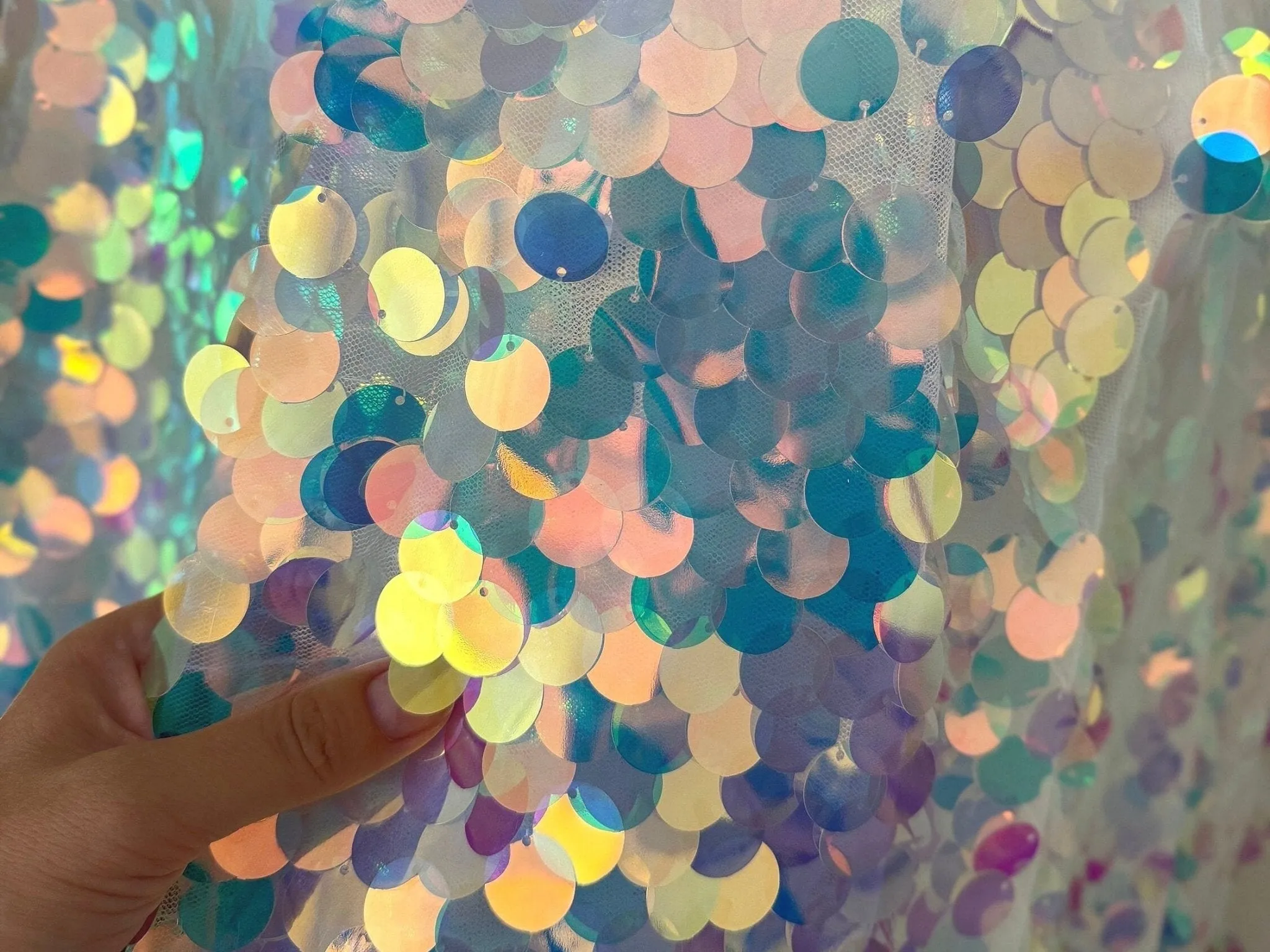 Iridescent Coin Sequin on White Mesh Fabric