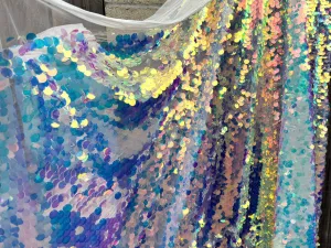Iridescent Coin Sequin on White Mesh Fabric
