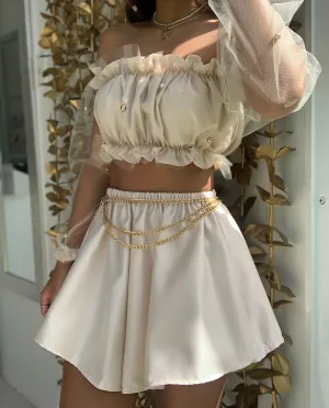 Pantalón corto crema
