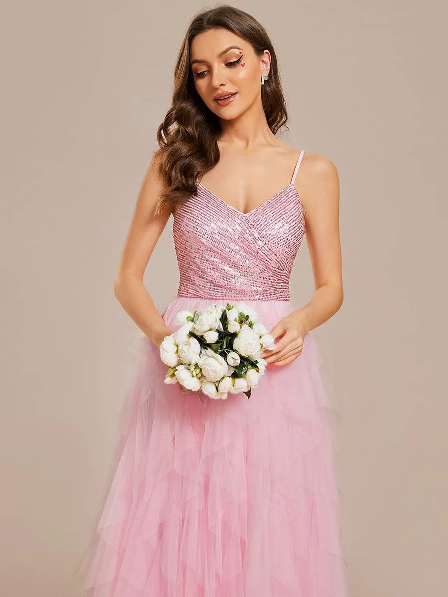 Robe de mariée en tulle scintillante à col en V et bretelles spaghetti