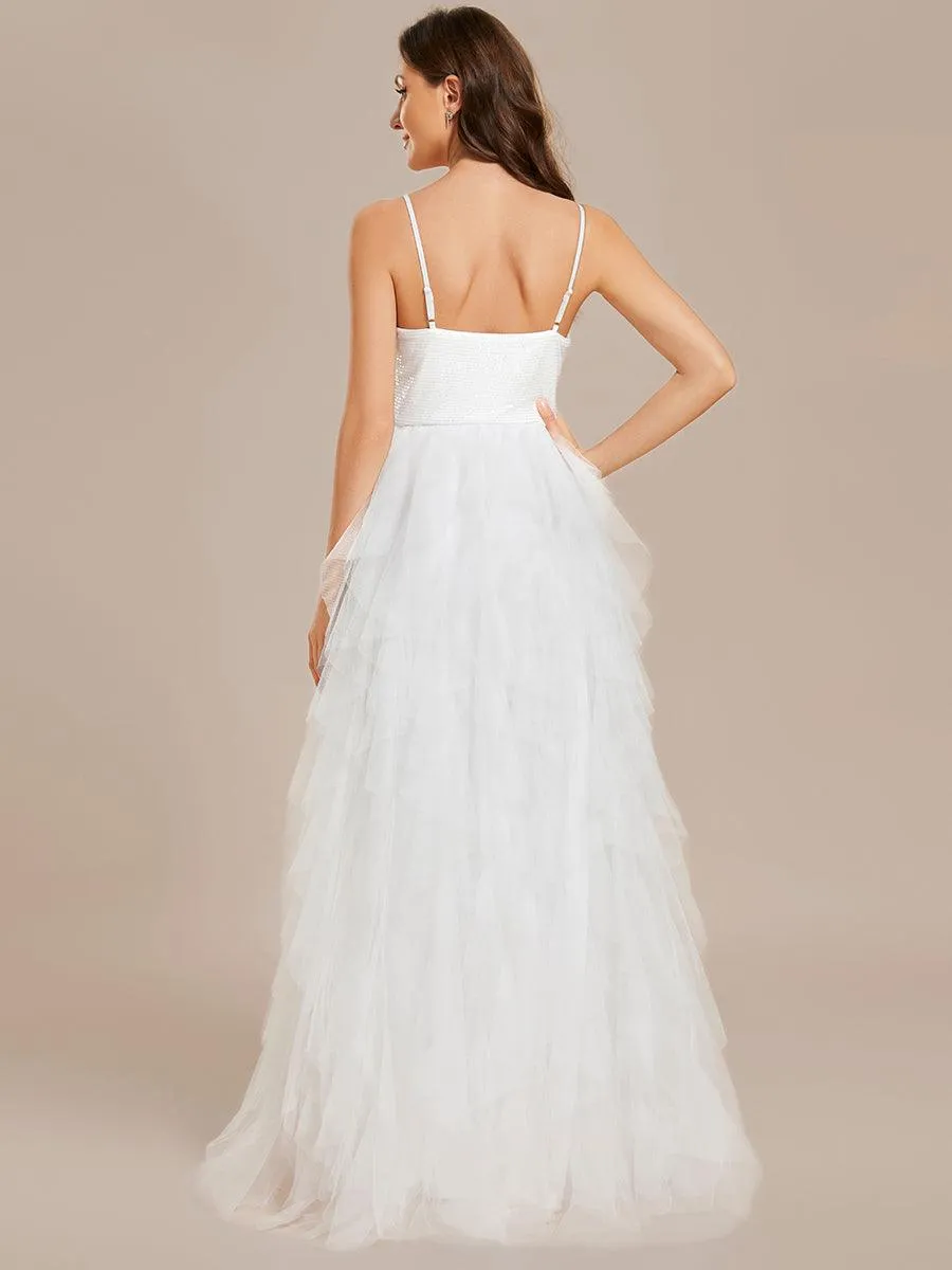 Robe de mariée en tulle scintillante à col en V et bretelles spaghetti