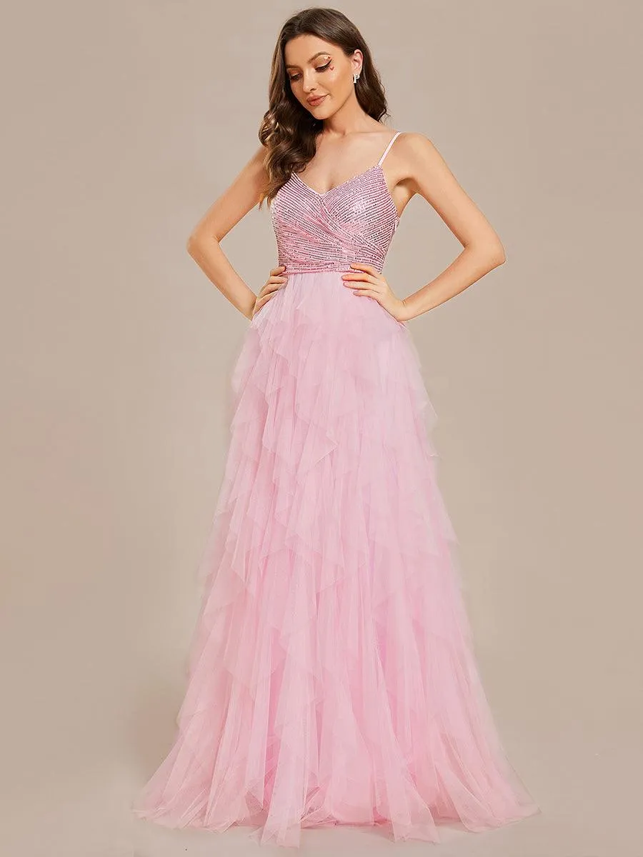 Robe de mariée en tulle scintillante à col en V et bretelles spaghetti