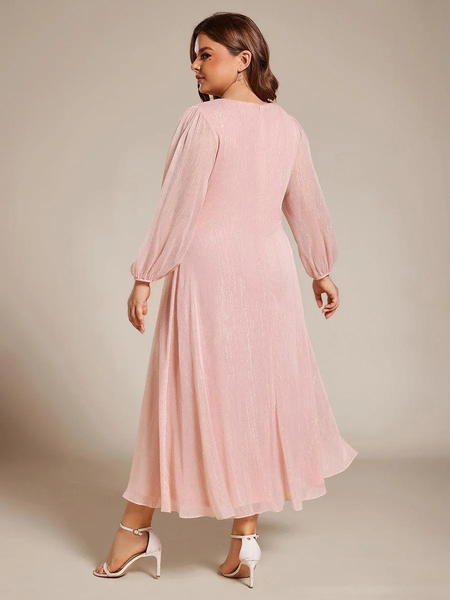 Robe d'invité trapèze en mousseline scintillante à manches longues et col en V