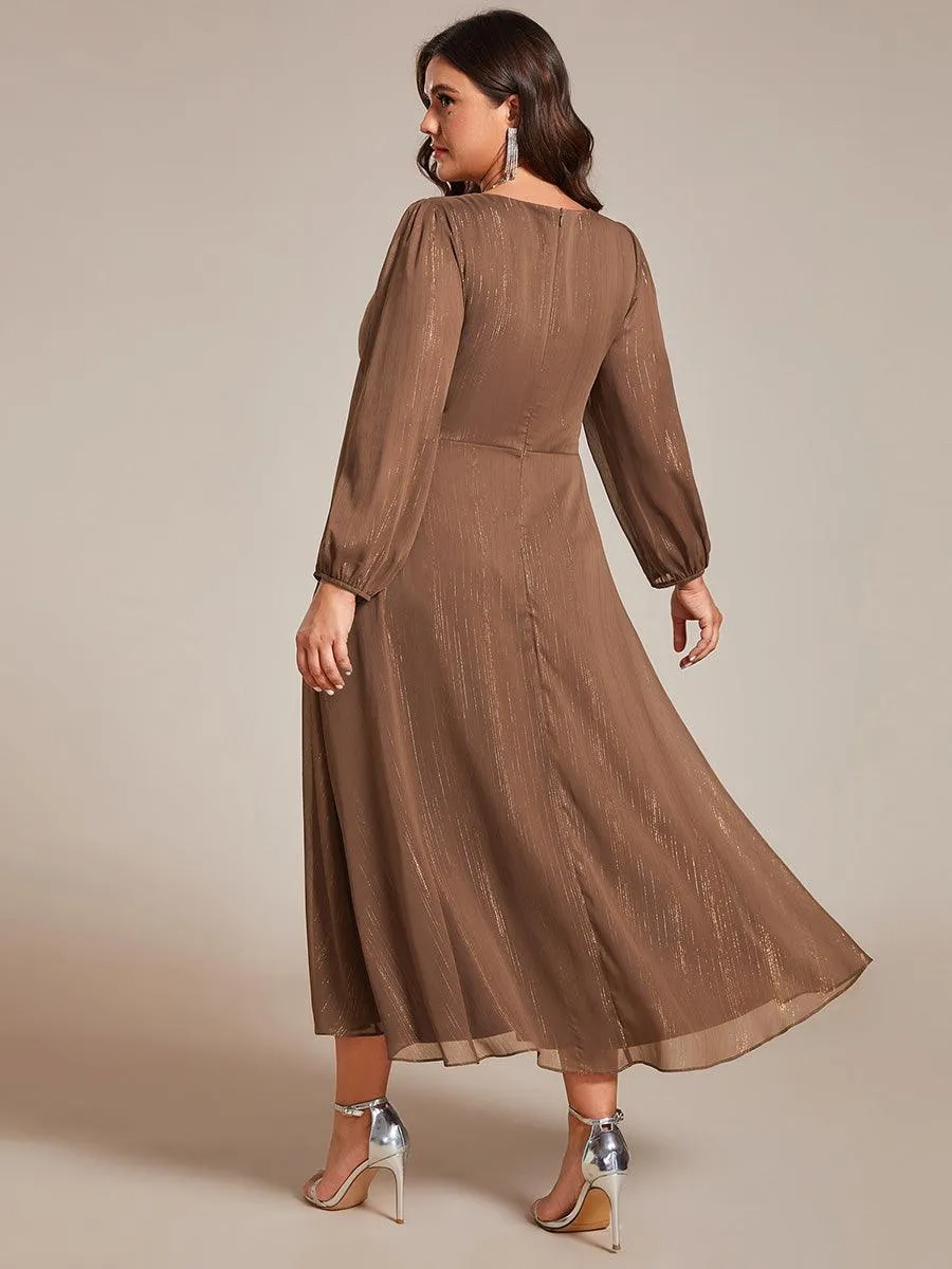 Robe d'invité trapèze en mousseline scintillante à manches longues et col en V