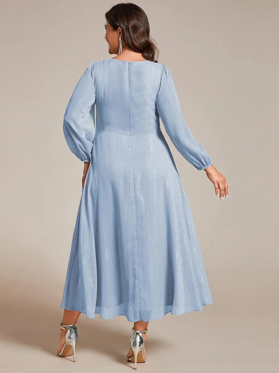 Robe d'invité trapèze en mousseline scintillante à manches longues et col en V