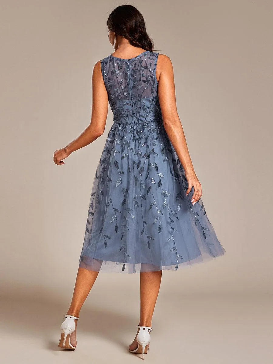 Robe d'invitée de mariage mi-longue à paillettes et col rond sans manches