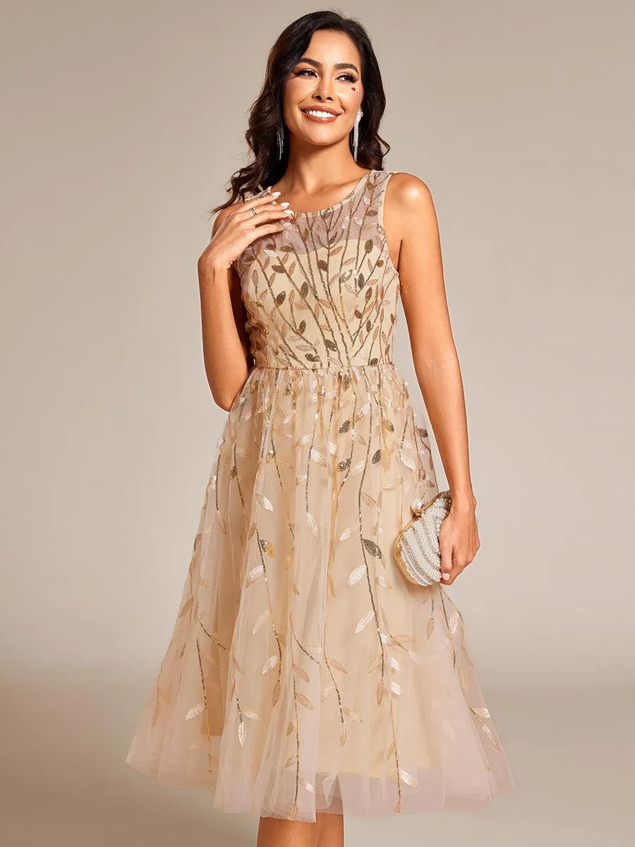 Robe d'invitée de mariage mi-longue à paillettes et col rond sans manches