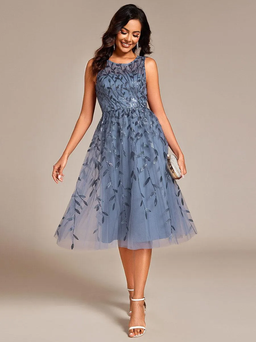 Robe d'invitée de mariage mi-longue à paillettes et col rond sans manches
