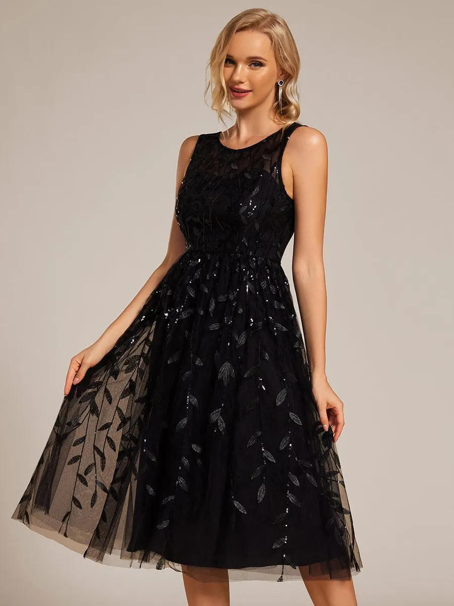 Robe d'invitée de mariage mi-longue à paillettes et col rond sans manches