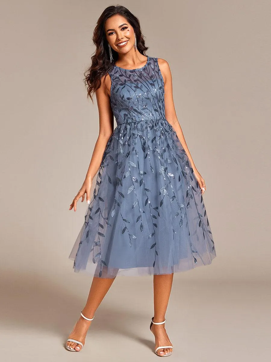 Robe d'invitée de mariage mi-longue à paillettes et col rond sans manches