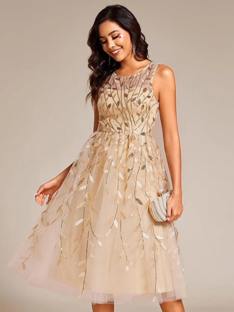 Robe d'invitée de mariage mi-longue à paillettes et col rond sans manches