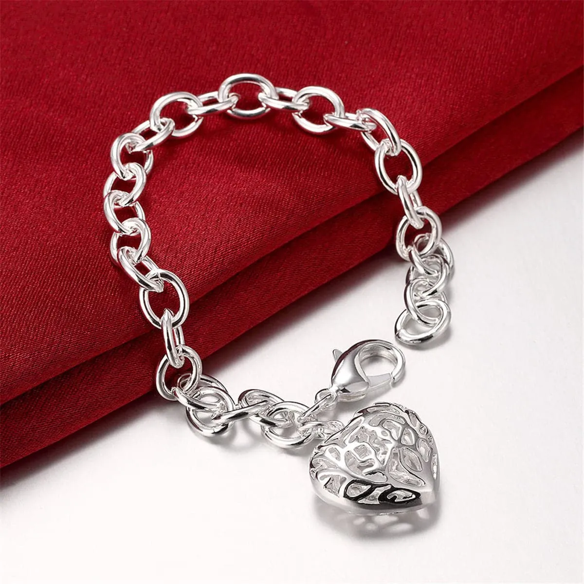 Silver-Plated Cutout Heart Charm Bracelet