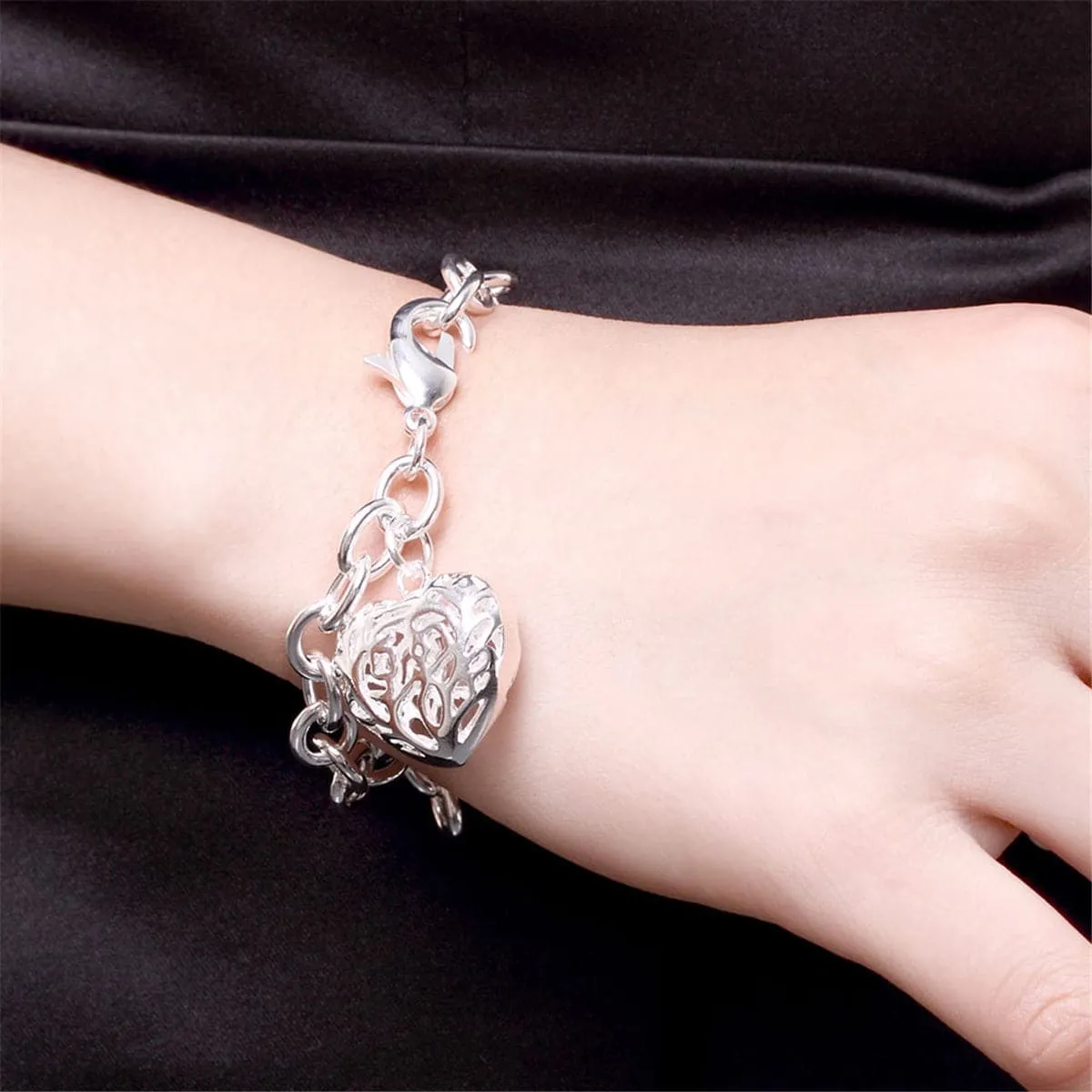 Silver-Plated Cutout Heart Charm Bracelet